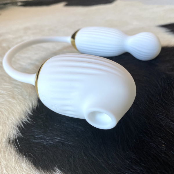 Vibrador com bullet giratório e sugador